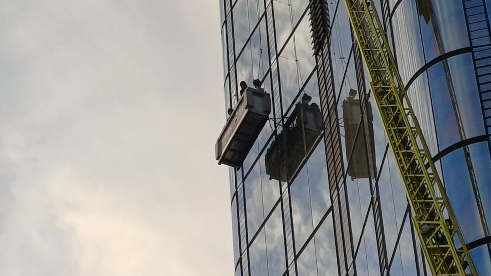 Window cleaners rescued from skyscraper