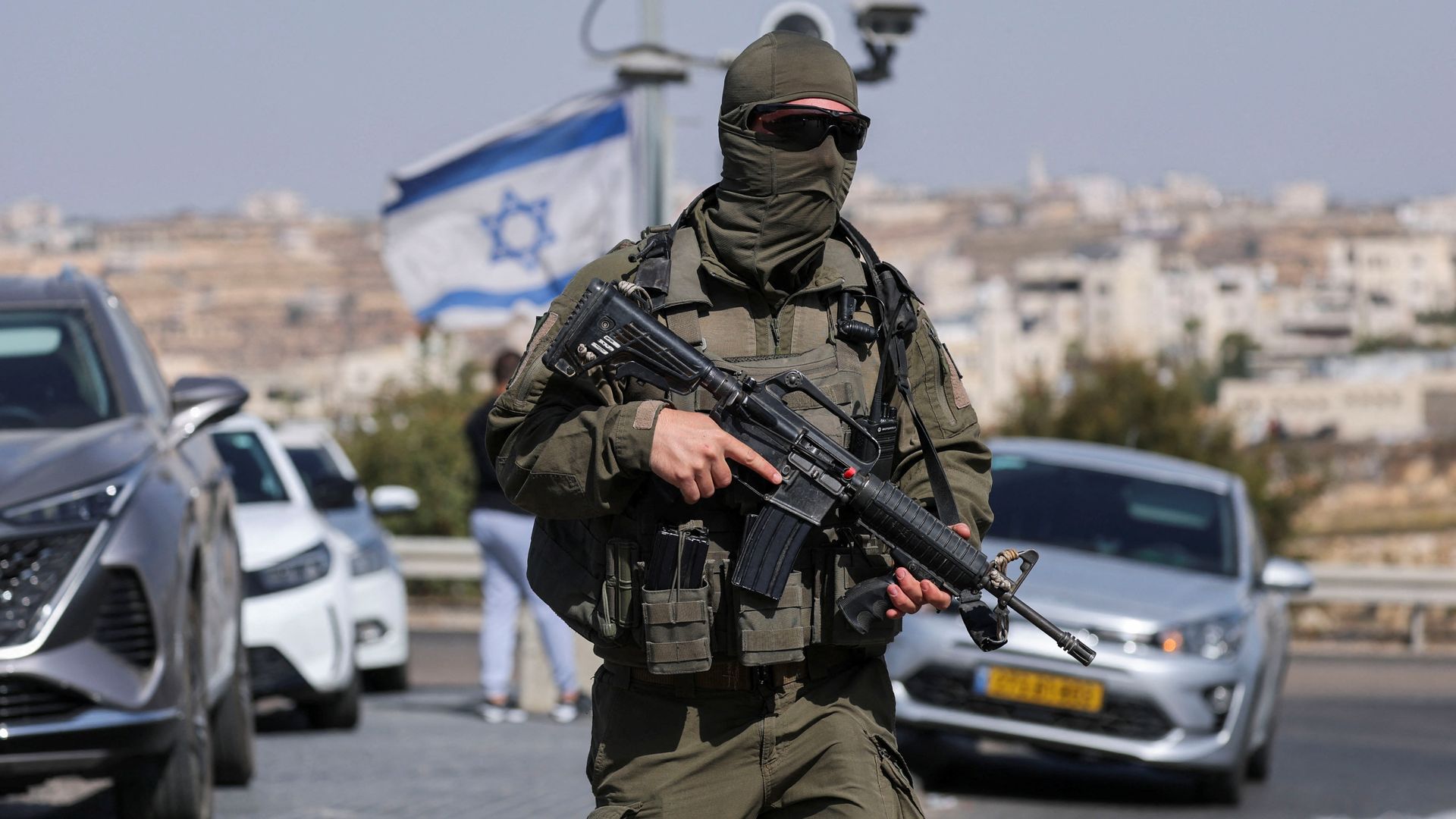 Israel orders army to prepare to fully close West Bank after two soldiers killed in shooting