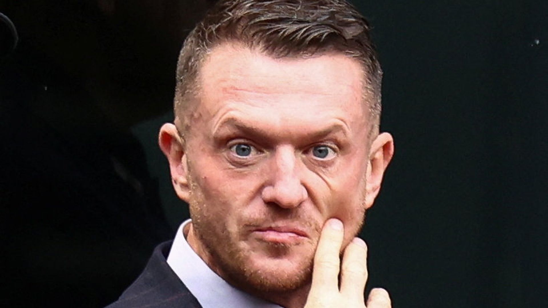 Tommy Robinson found guilty of harassing two journalists