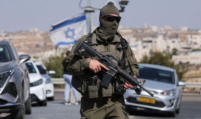 Israel orders army to prepare to fully close West Bank after two soldiers killed in shooting