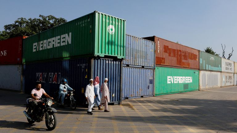 Shipping containers used to block an area ahead of a planned protest. Pics: Reuters