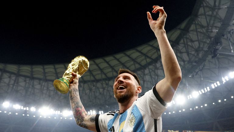 Messi with the World Cup trophy in 2022. Pic: Reuters